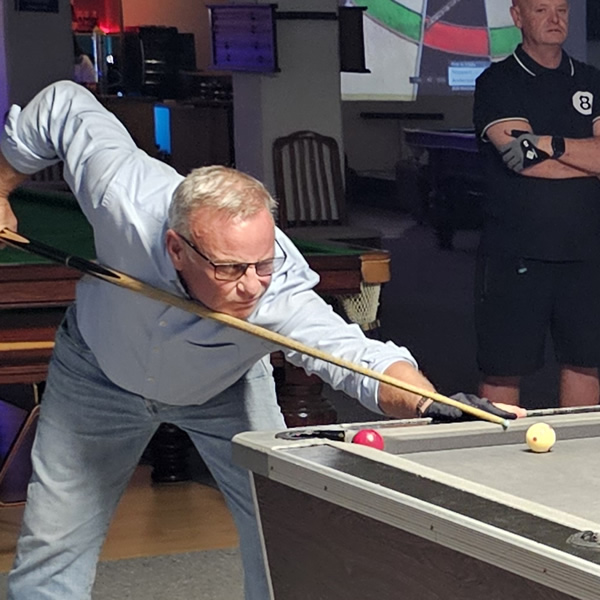 mark_f_spoons_taking_pool_shot_600x